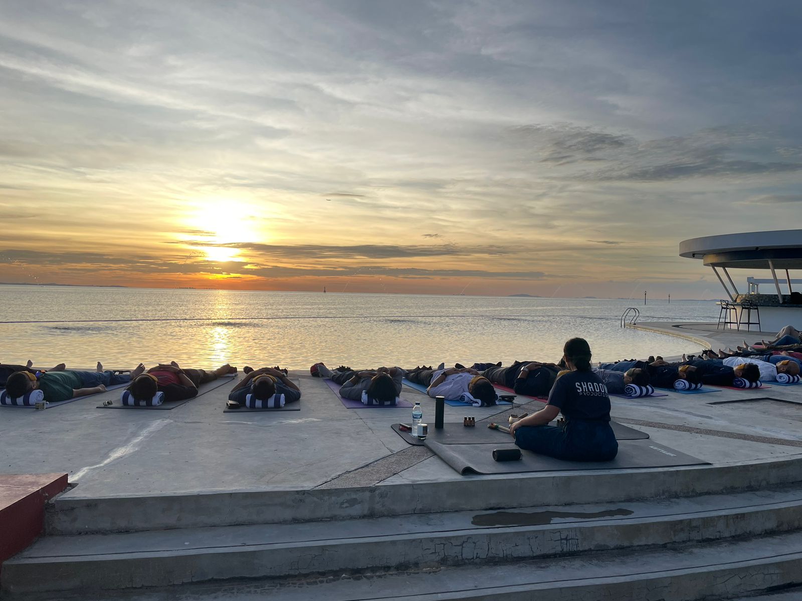 A group Yoga during sunset time