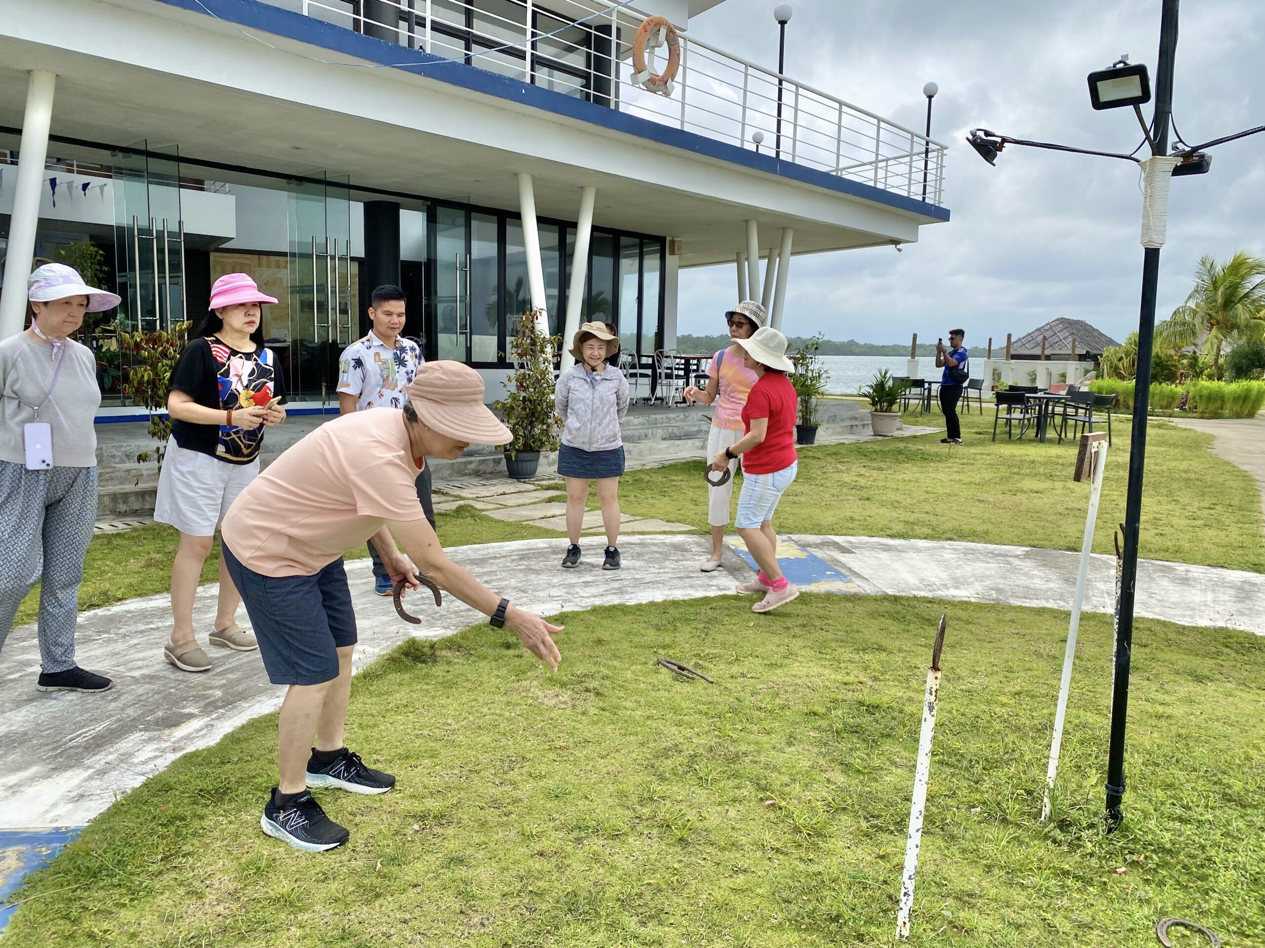 Its never too old to try this horse-shoe pitching