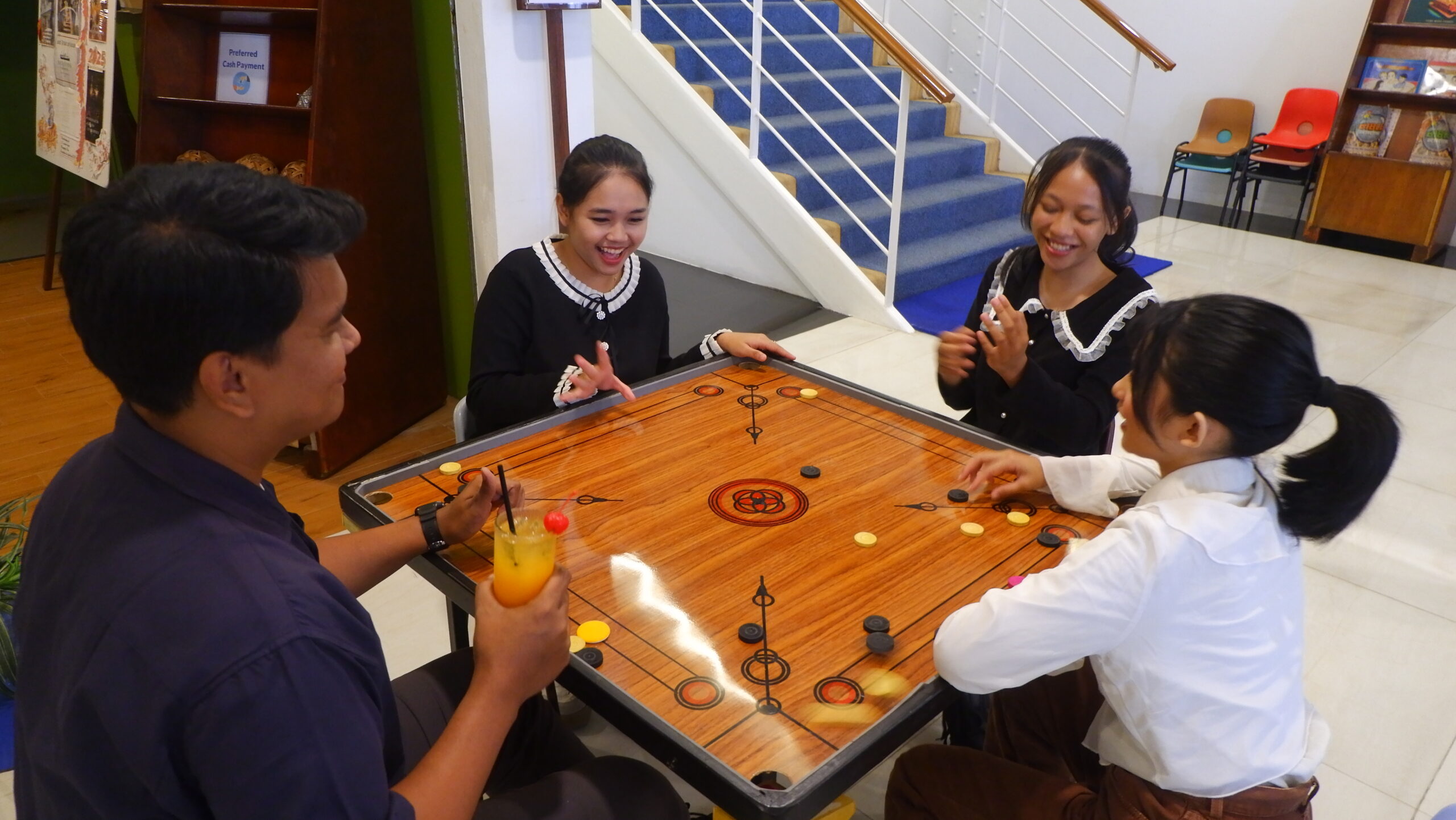 Spend a quality time with our Carrom board game