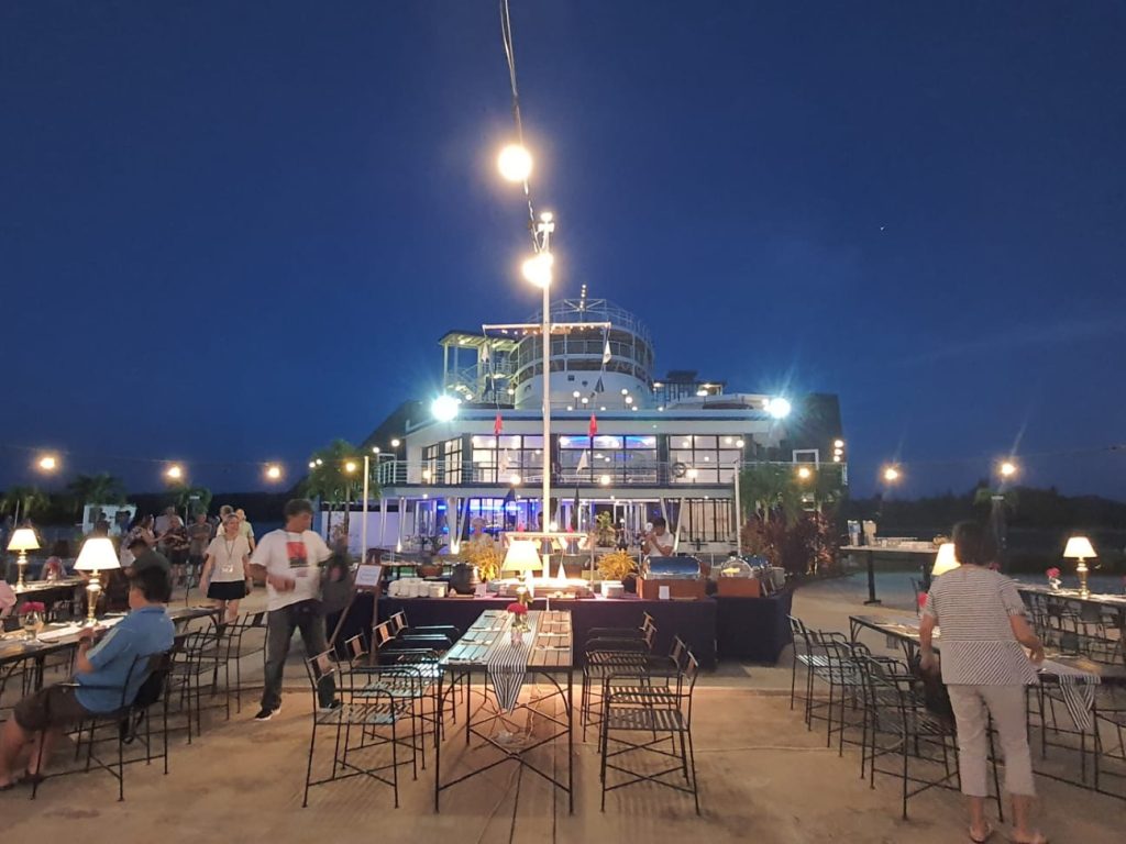 Buffet line with Ship as the background
